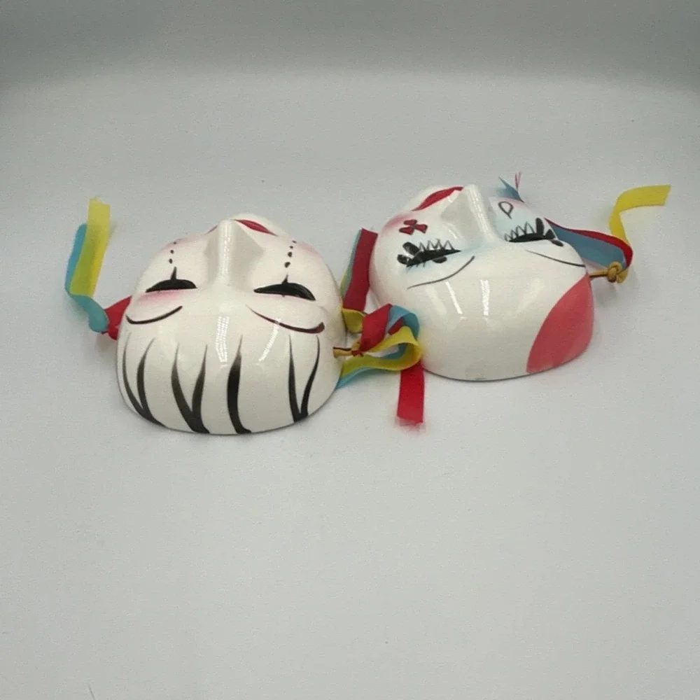 2 White Ceramic Painted carnival Face Masks wall Art